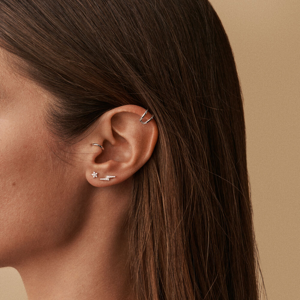 Tragus piercing helix outlet